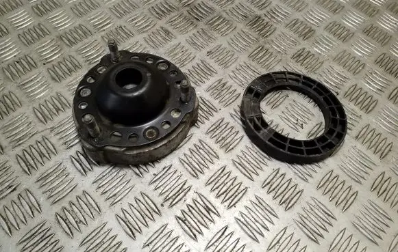 Volkswagen Touareg II Coil spring mount 7P0412347 7P0411177