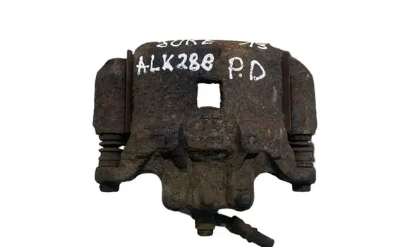 Nissan Juke I F15 Front brake caliper