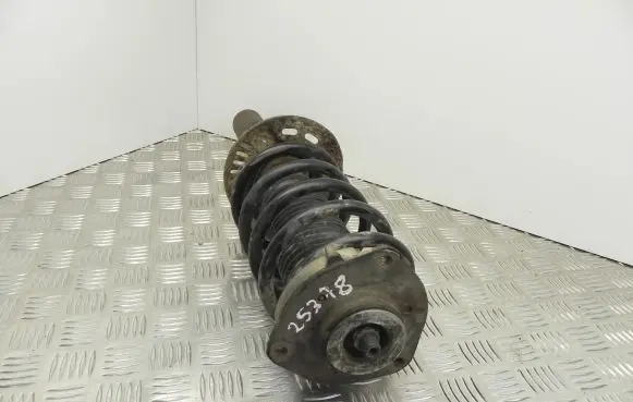 Volkswagen Caddy Front shock absorber with coil spring AGW057MT
