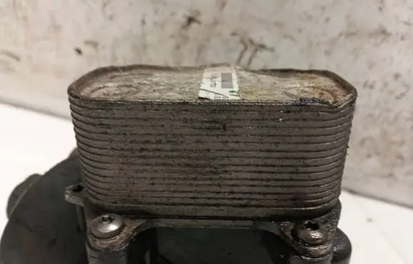 Volkswagen Cross Polo Engine oil radiator 03l117021c