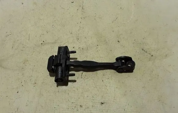 Front door check strap stopper
