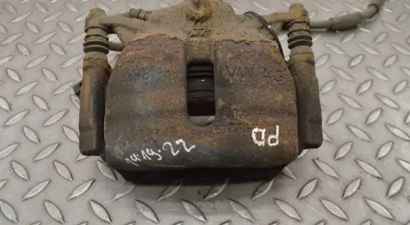 Volkswagen Golf VII Front brake caliper