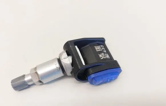 Mercedes-Benz C W206 Tire pressure sensor A0009058413