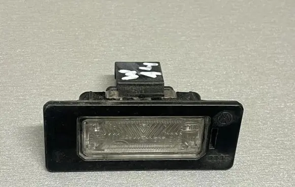 Volkswagen PASSAT B6 Number plate light A04634Y