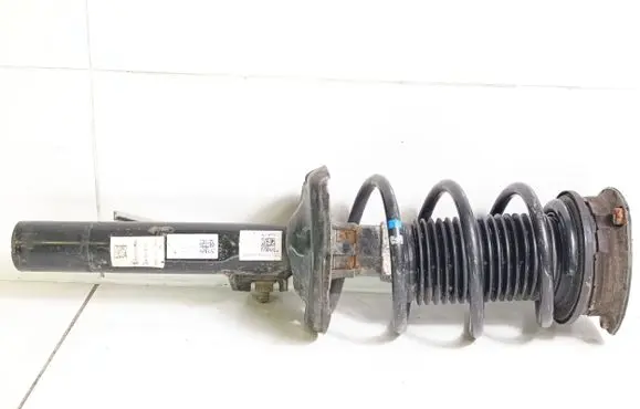 Volkswagen Golf VII Front shock absorber with coil spring 5Q0413023FK 5Q0412013BR