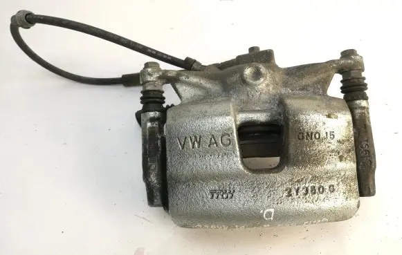 Volkswagen Golf VII Front brake caliper