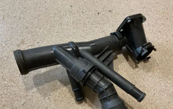 Thermostat/thermostat housing