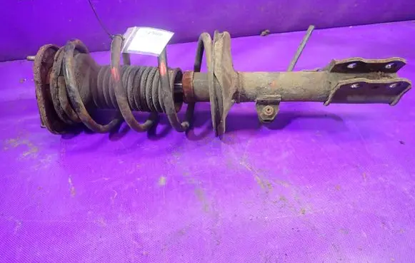 Toyota Corolla E120 E130 Front shock absorber with coil spring