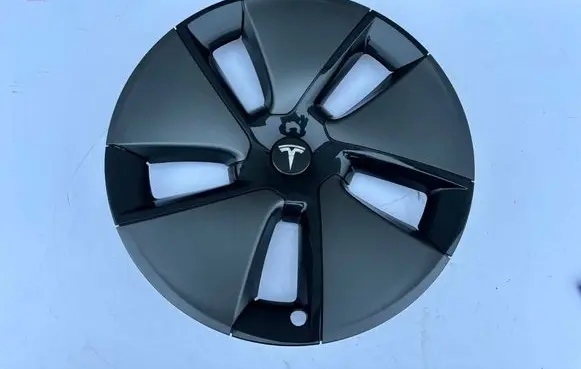 Tesla Model 3 R18 wheel hub/cap/trim 104427100A