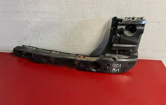 Rear bumper mounting bracket