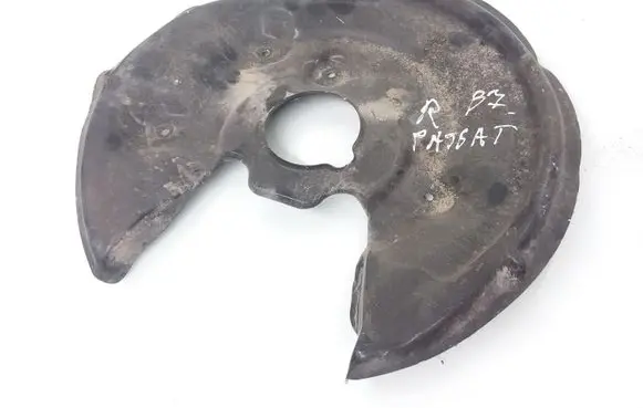 Volkswagen PASSAT B7 Rear brake disc plate dust cover 5N0615612C