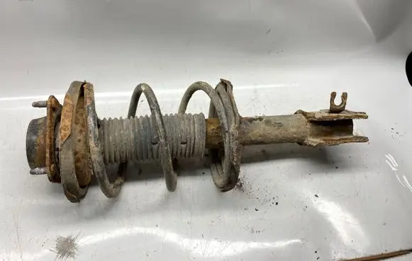 Mazda 626 Front shock absorber with coil spring