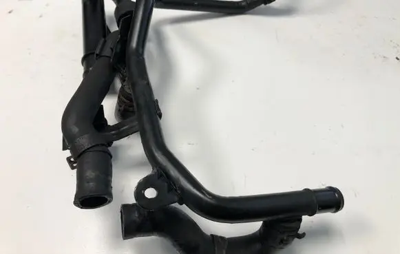 Volkswagen Golf VII Engine coolant pipe/hose 5Q0121619B 5Q0121070AH