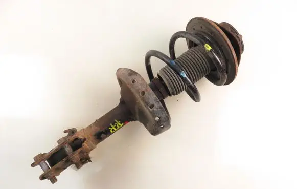 Subaru Impreza III Front shock absorber with coil spring 