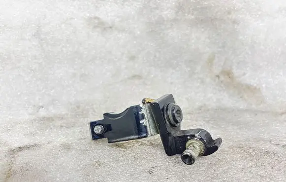 Front door lower hinge