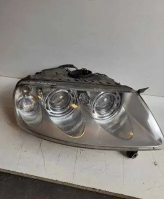 Volkswagen Touareg I Headlight/headlamp 7L6941016CF 89307861