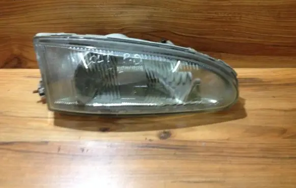Mitsubishi Colt Headlight/headlamp 10087777 100-87777