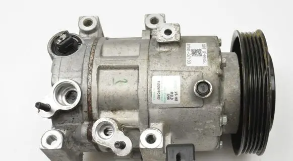 KIA Sportage Air conditioning (A/C) compressor (pump) 97701D7100