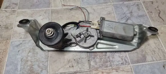 Mazda 323 F Rear window wiper motor 34928581