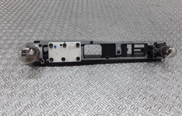 Tail light bulb cover holder