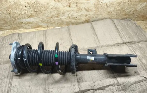 Front shock absorber with coil spring