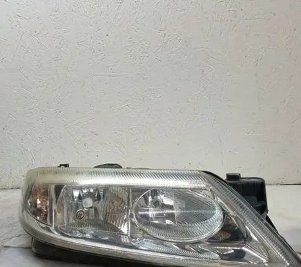 Renault Laguna II Headlight/headlamp 89004940