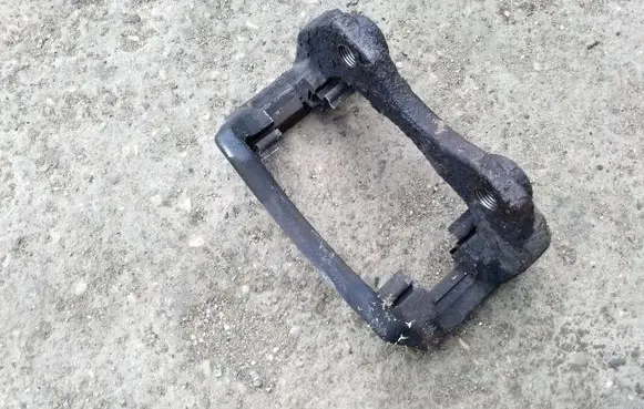 Nissan Primera Front Brake Caliper Pad/Carrier 
