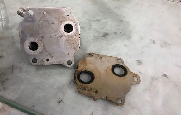 Hyundai Tucson IV NX4 Oil filter mounting bracket 264102u000