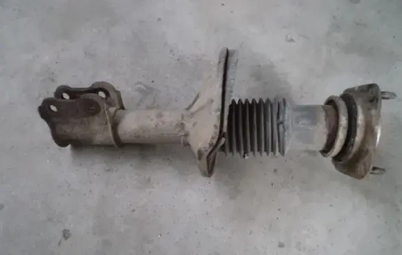 KIA Clarus Front shock absorber with coil spring