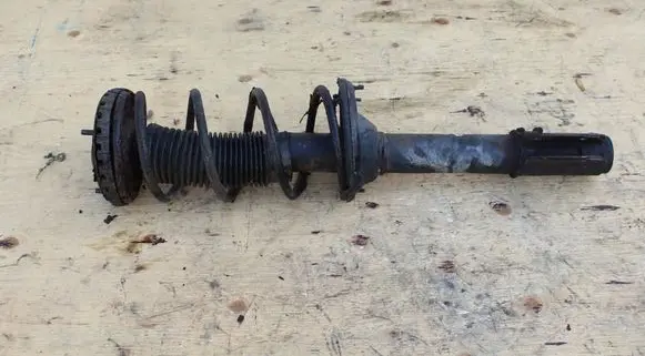 Subaru Forester SF Front shock absorber with coil spring 20360FC250