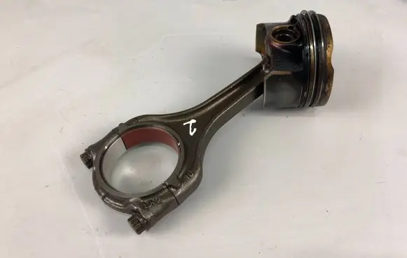 Volkswagen Golf VIII Piston with connecting rod 05EAQ L1606095 1606095