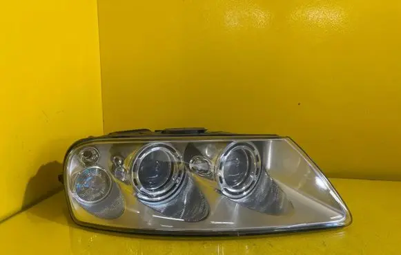 Volkswagen Touareg I Headlight/headlamp 7L6941016BK