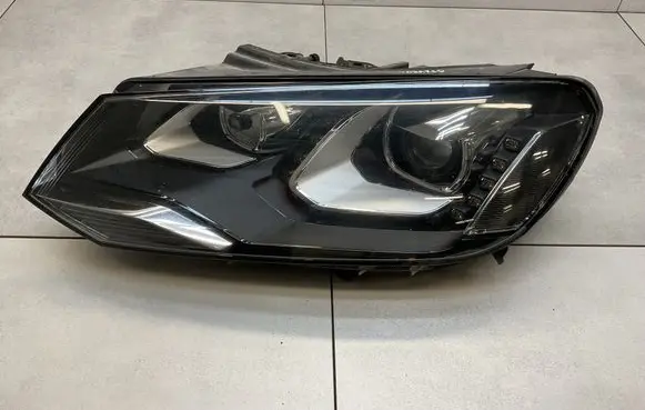 Volkswagen Touareg II Headlight/headlamp 7P2941751