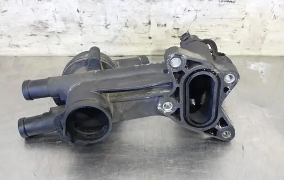 Thermostat/thermostat housing