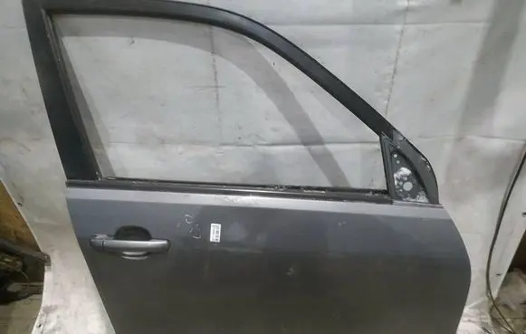 Suzuki Grand Vitara II Front door PILKOS