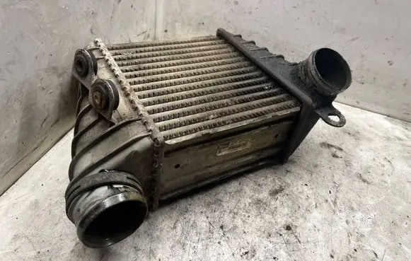Volkswagen Golf IV Intercooler radiator 1J0145805D