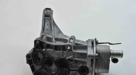 Jaguar XF X250 Engine oil radiator 8674749780