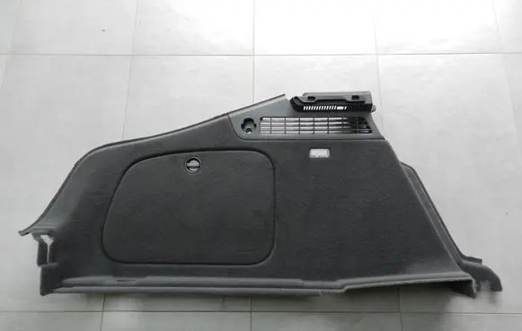 Trunk/boot lower side trim panel