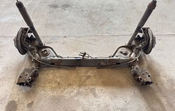 Nissan Juke I F15 Rear axle beam 