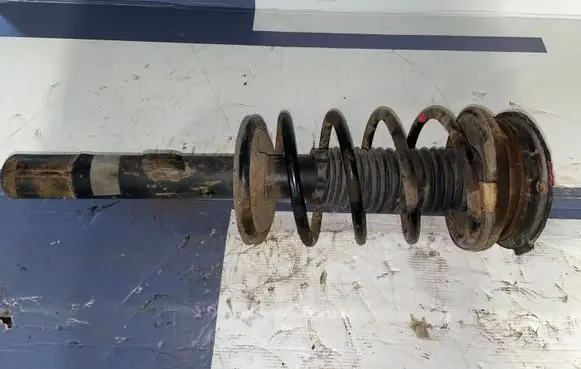 Front shock absorber with coil spring