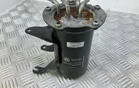 Volkswagen Jetta VI Fuel filter housing 1K0127399CK 1K0127400L