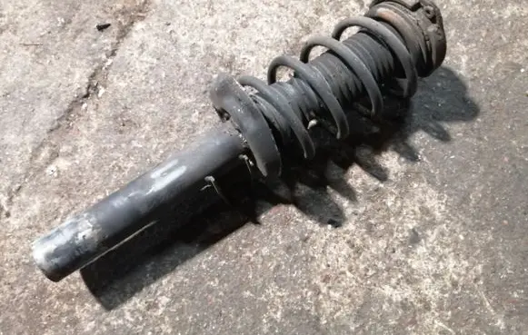 Volkswagen PASSAT CC Front shock absorber with coil spring