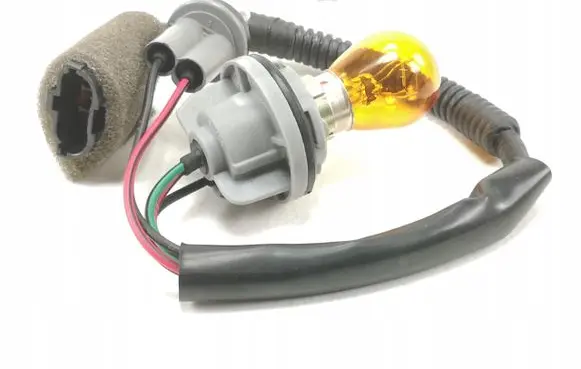 KIA Sephia Headlight/headlamp bulb 0K21151064A