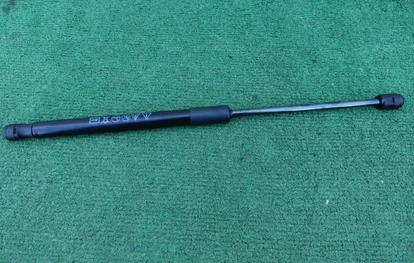 Volkswagen Tiguan Front bonnet/hood damper/strut 571823359A
