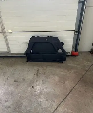 Trunk/boot lower side trim panel