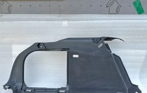Trunk/boot lower side trim panel