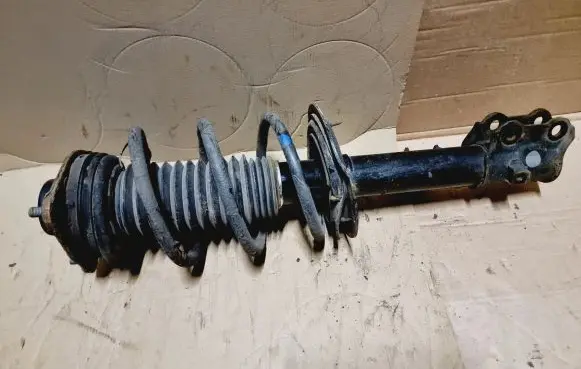 KIA Sportage Front shock absorber with coil spring 546613U000 546302Y350