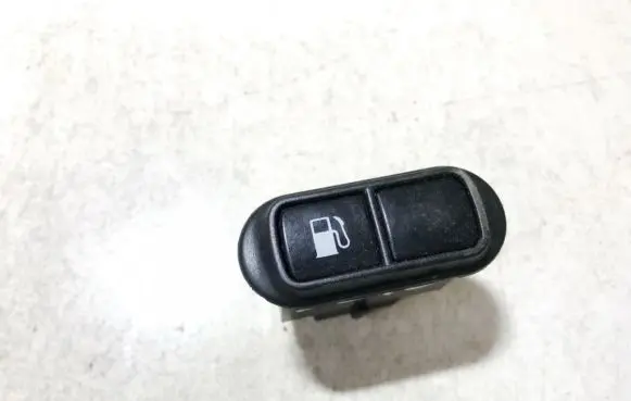 KIA Carnival Fuel tank opening switch 