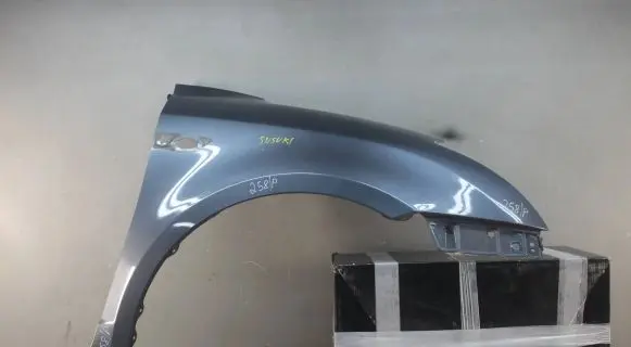 Suzuki Swift I Fender mounting bracket