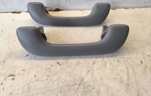 Renault Trafic II (X83) A set of handles for the ceiling 8200000099